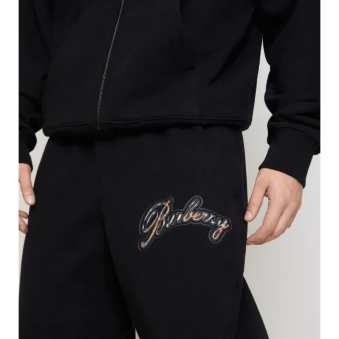 Jogginghose aus Baumwolle mit kursivem Logo im Karomuster